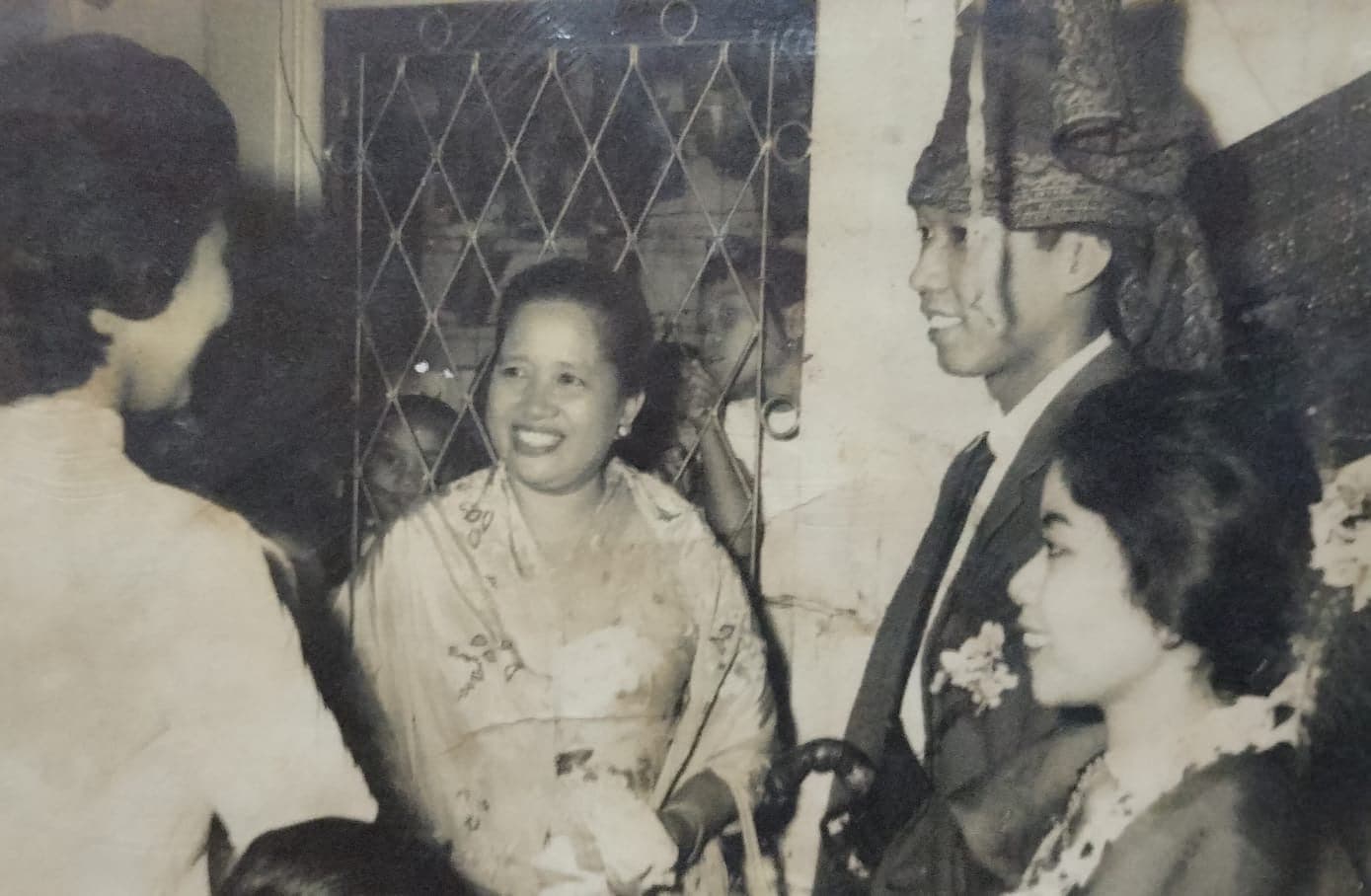 Yani’s grandmother, the Mother of Chilli, in her kitchen — a vintage family portrait